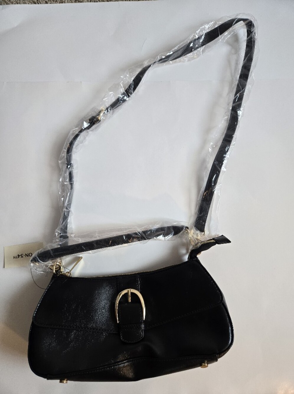 Classic Black Shoulder Bag with Gold Buckle Accent